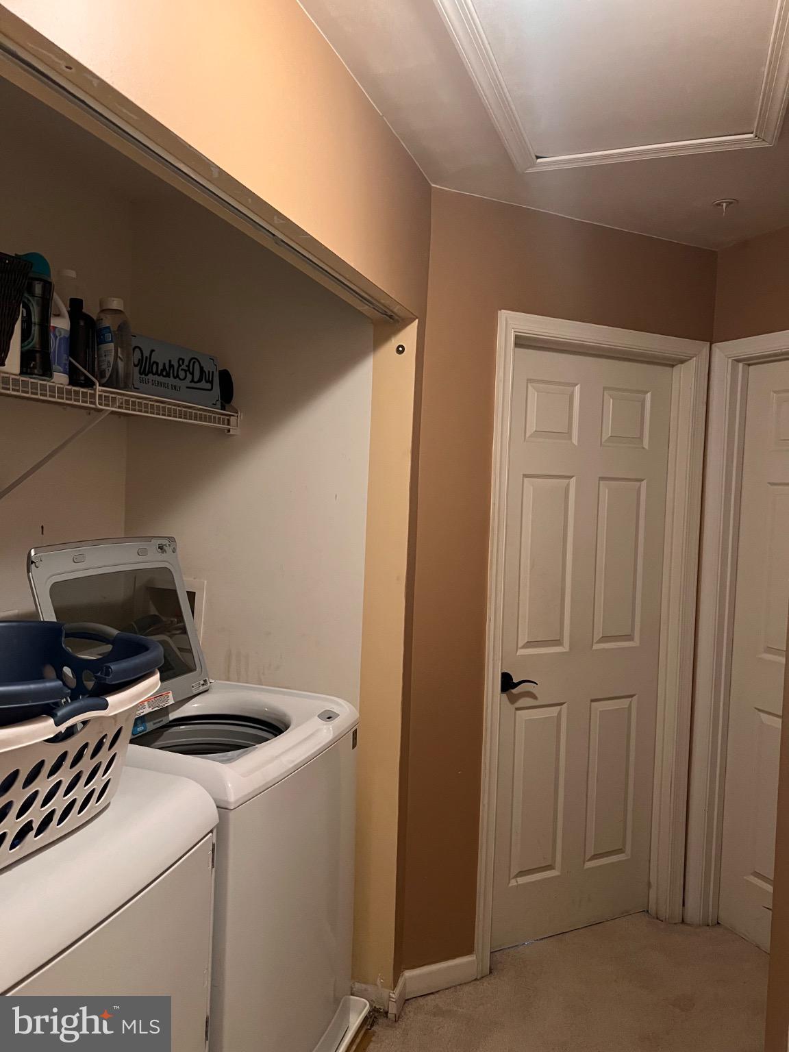 103 Canvasback Way Cambridge, MD 21613 - Photo 27 of 39 a view of storage and utility room with washer and dryer