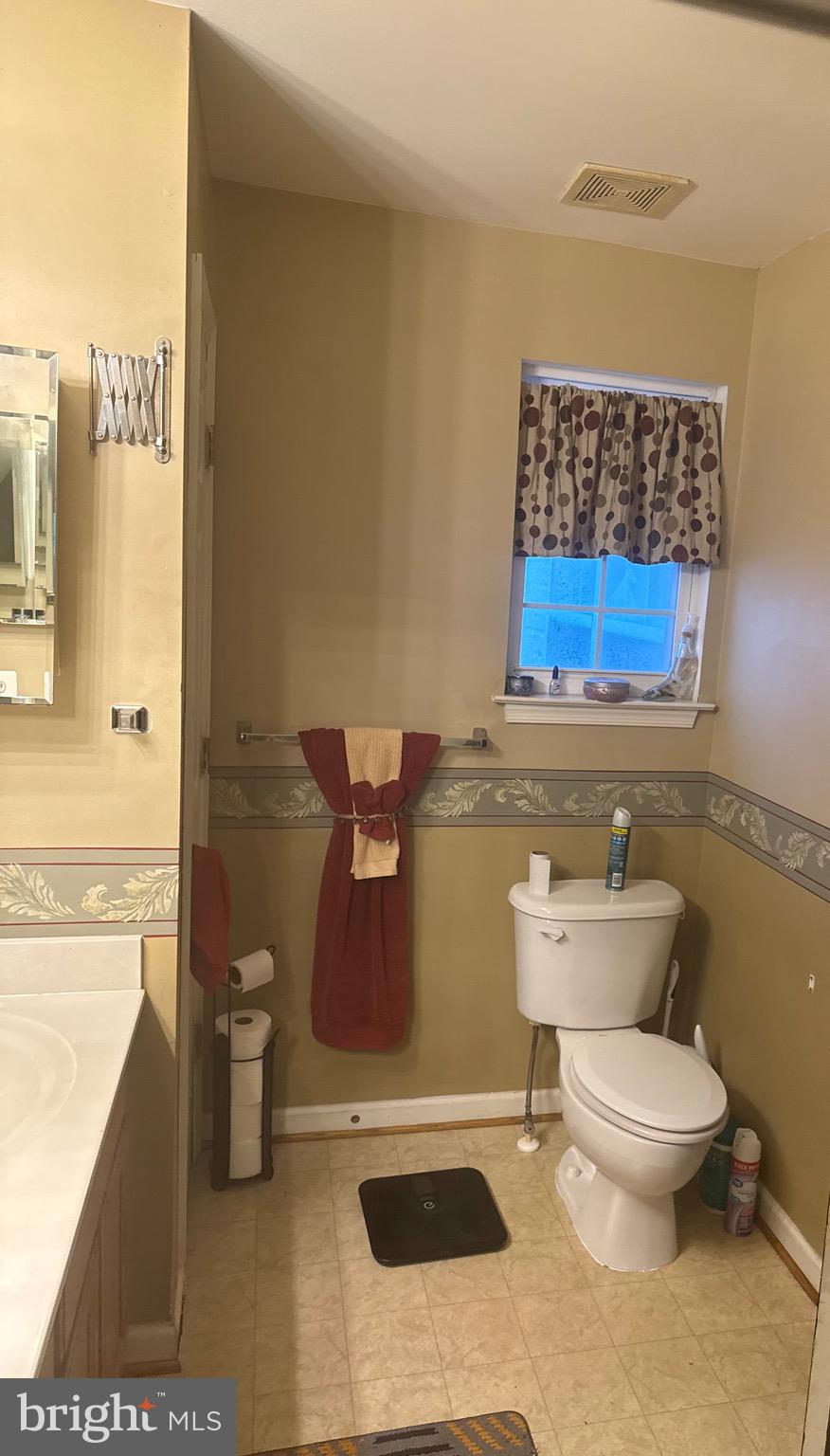 103 Canvasback Way Cambridge, MD 21613 - Photo 34 of 39 a bathroom with a toilet a sink and a bathtub