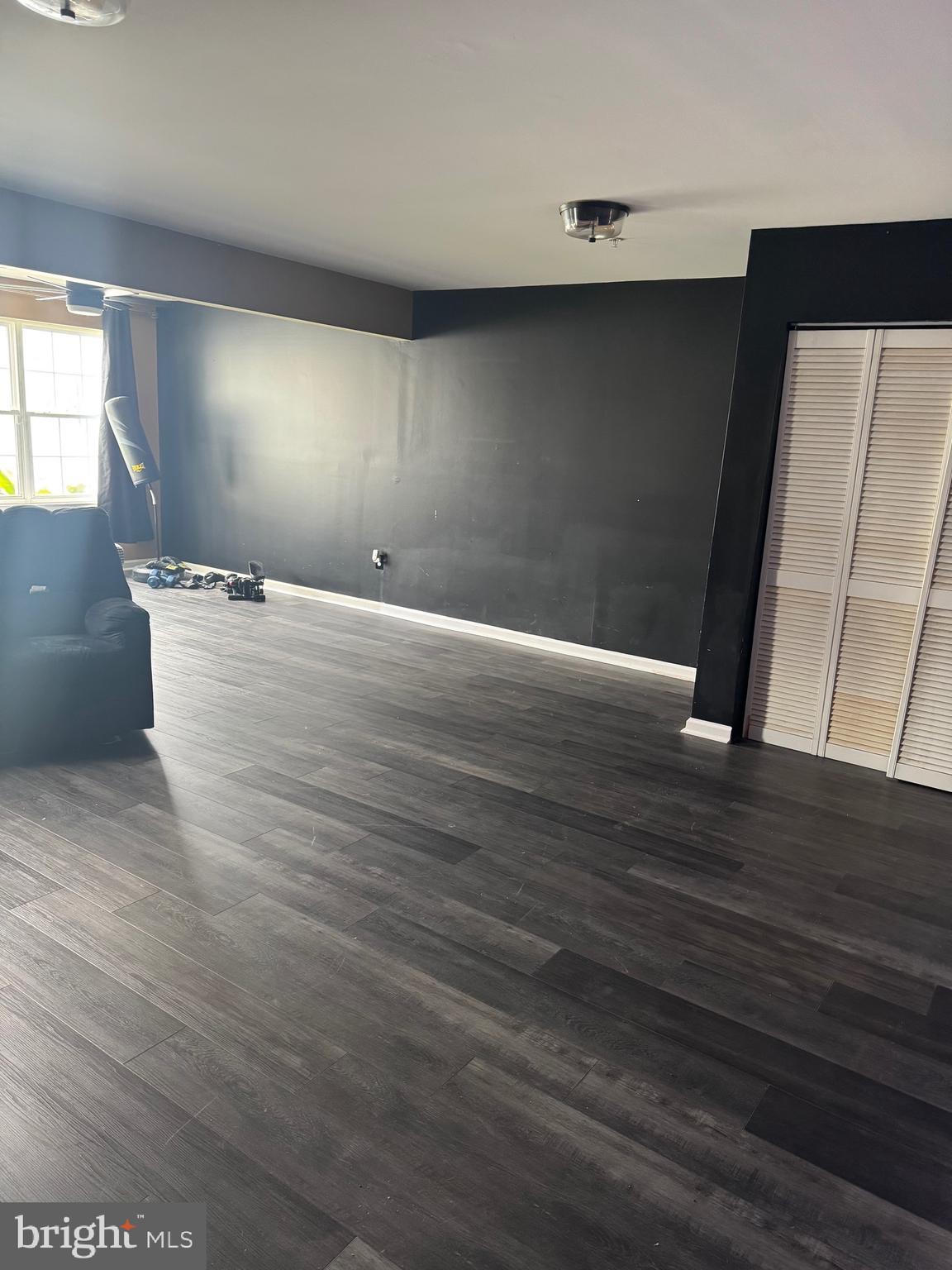 103 Canvasback Way Cambridge, MD 21613 - Photo 37 of 39 a view of an empty room with wooden floor