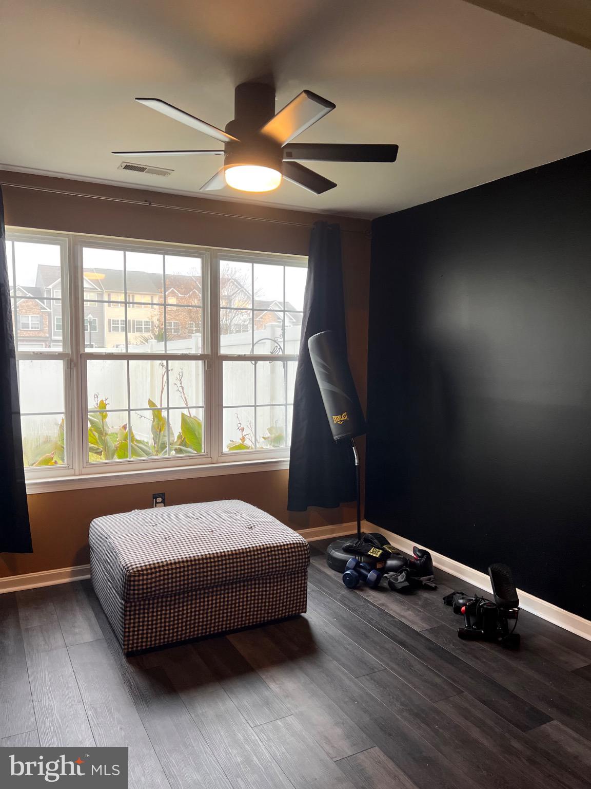 103 Canvasback Way Cambridge, MD 21613 - Photo 5 of 39 a bed sitting in a room next to a window
