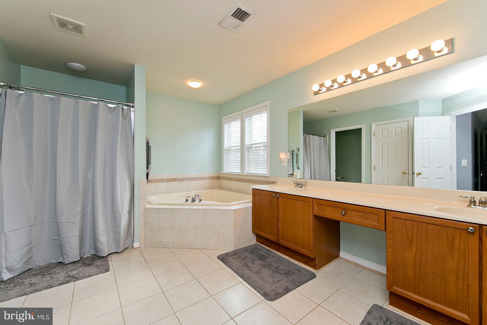 655 Triumphant Way Falling Waters, WV 25419 - Photo 36 of 71 Tile floor in Master Bath