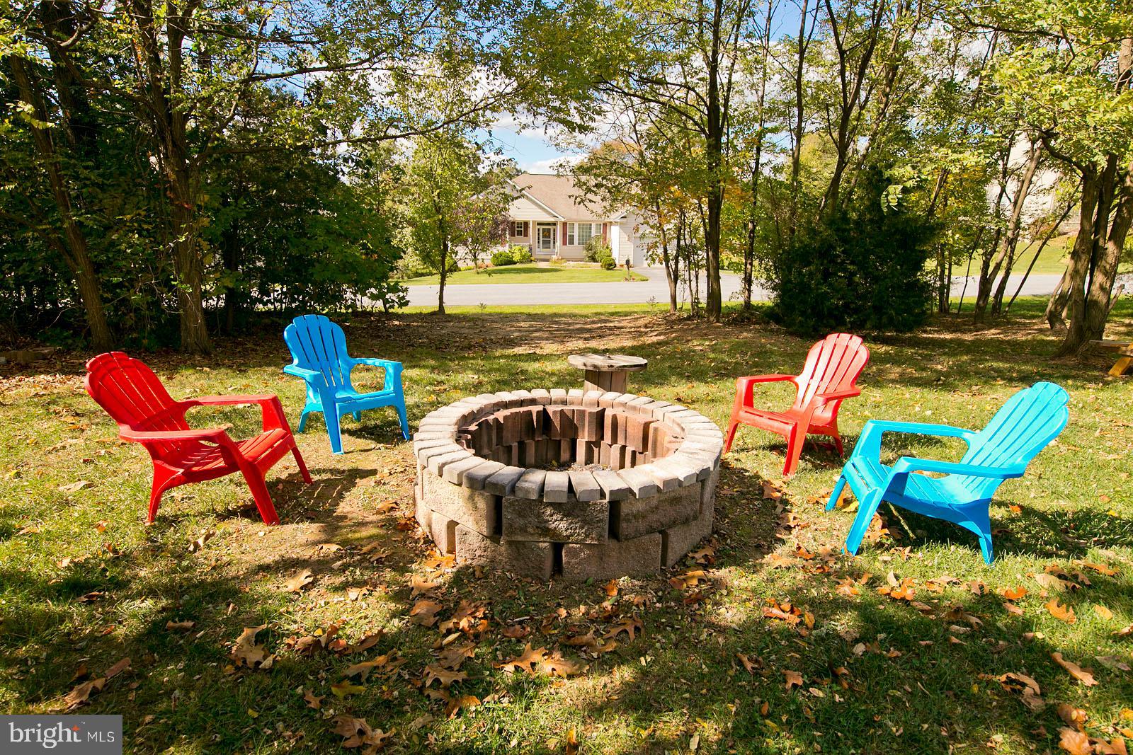 655 Triumphant Way Falling Waters, WV 25419 - Photo 63 of 71 Fire pit deep in the back yard