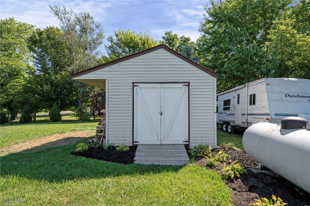 9208 Thorpe Road Berlin Heights, OH 44814 - Photo 36 of 47 View of shed featuring view of scattered trees