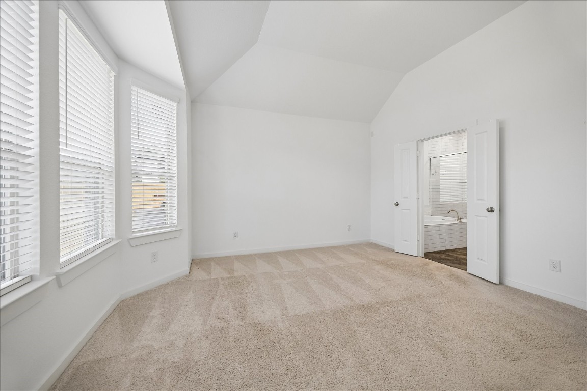 15823 Bird Of Conroe, TX 77302 - Photo 15 of 27 a view of an empty room with a window