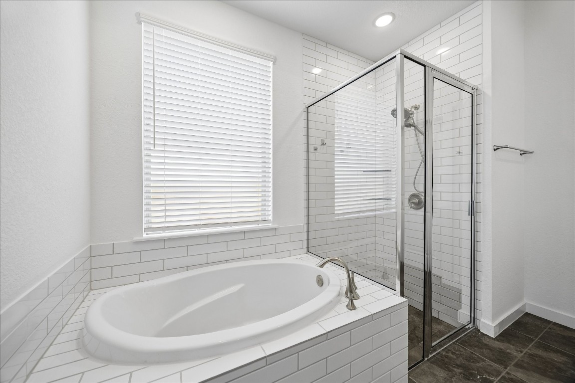 15823 Bird Of Conroe, TX 77302 - Photo 17 of 27 a bathroom with a tub and shower