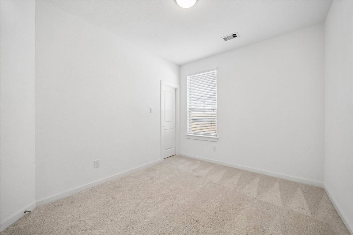 15823 Bird Of Conroe, TX 77302 - Photo 22 of 27 an empty room with windows