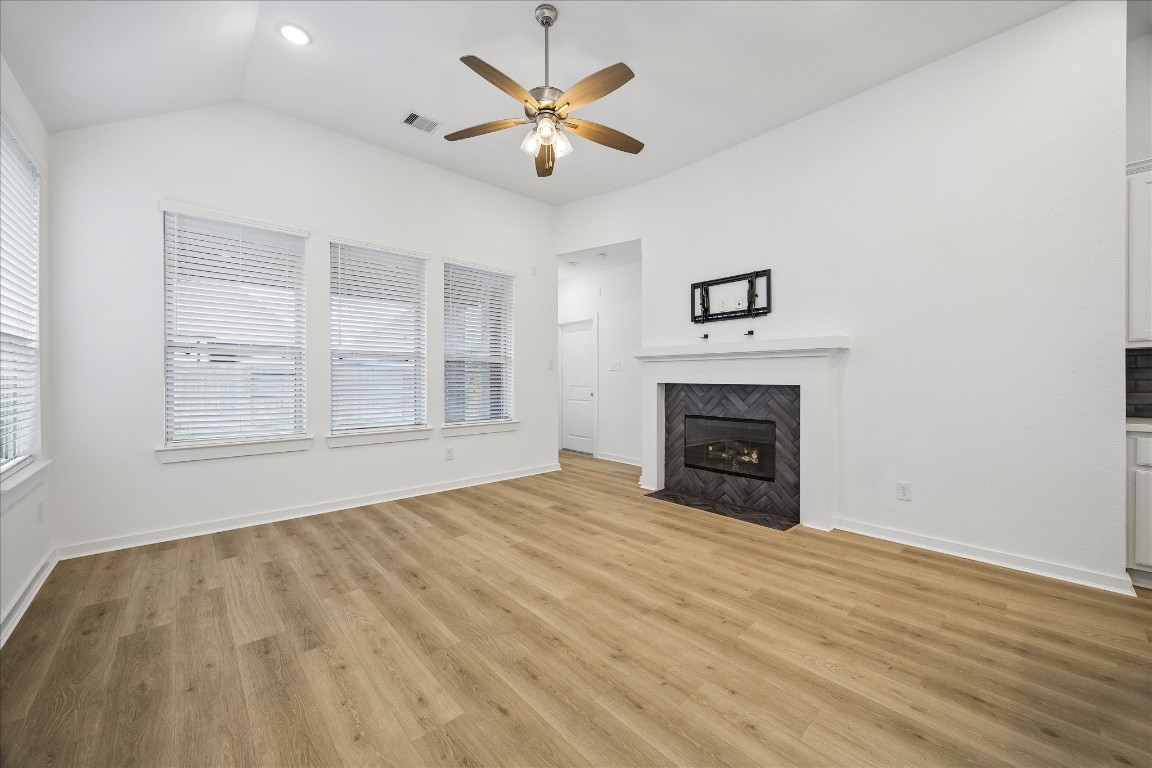 15823 Bird Of Conroe, TX 77302 - Photo 10 of 27 a view of empty room with wooden floor and fan