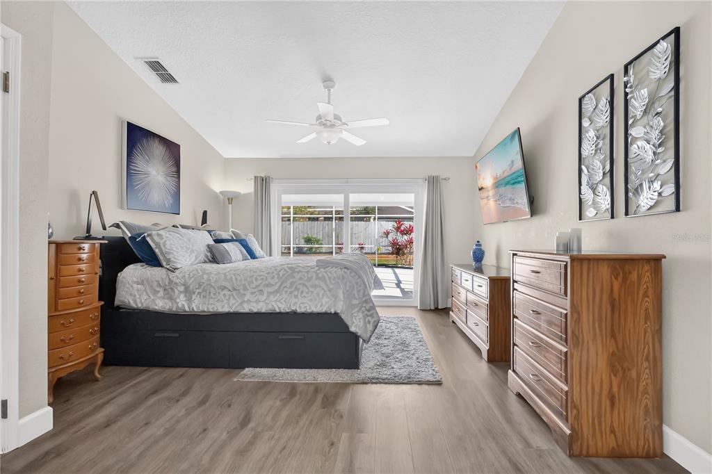 9426 Palm Tree Drive Windermere, FL 34786 - Photo 11 of 29 a living room with furniture and a large window