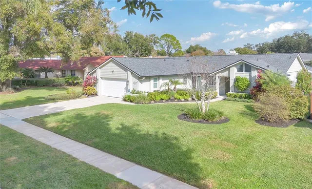 a aerial view of a house with a garden