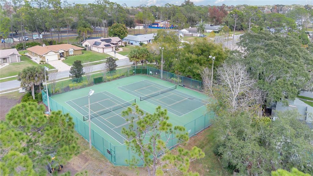 9426 Palm Tree Drive Windermere, FL 34786 - Photo 29 of 29 an aerial view of a house with yard swimming pool and lake view