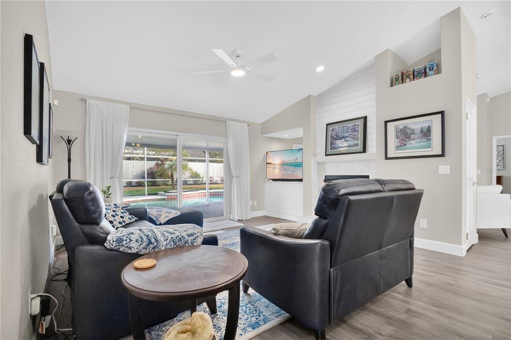 9426 Palm Tree Drive Windermere, FL 34786 - Photo 6 of 29 a living room with furniture and a large window