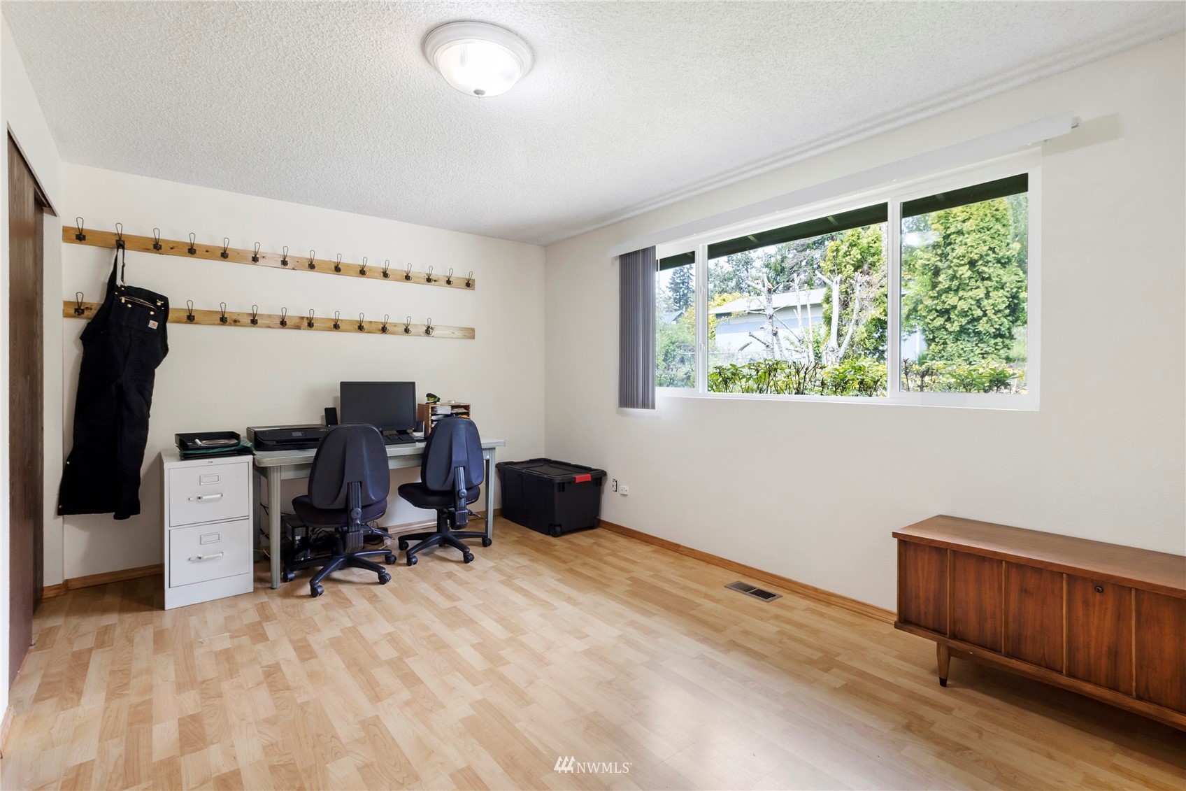 11306 Karshner Road East Edgewood, WA 98372 - Photo 14 of 31 a view of a workspace with furniture and a window