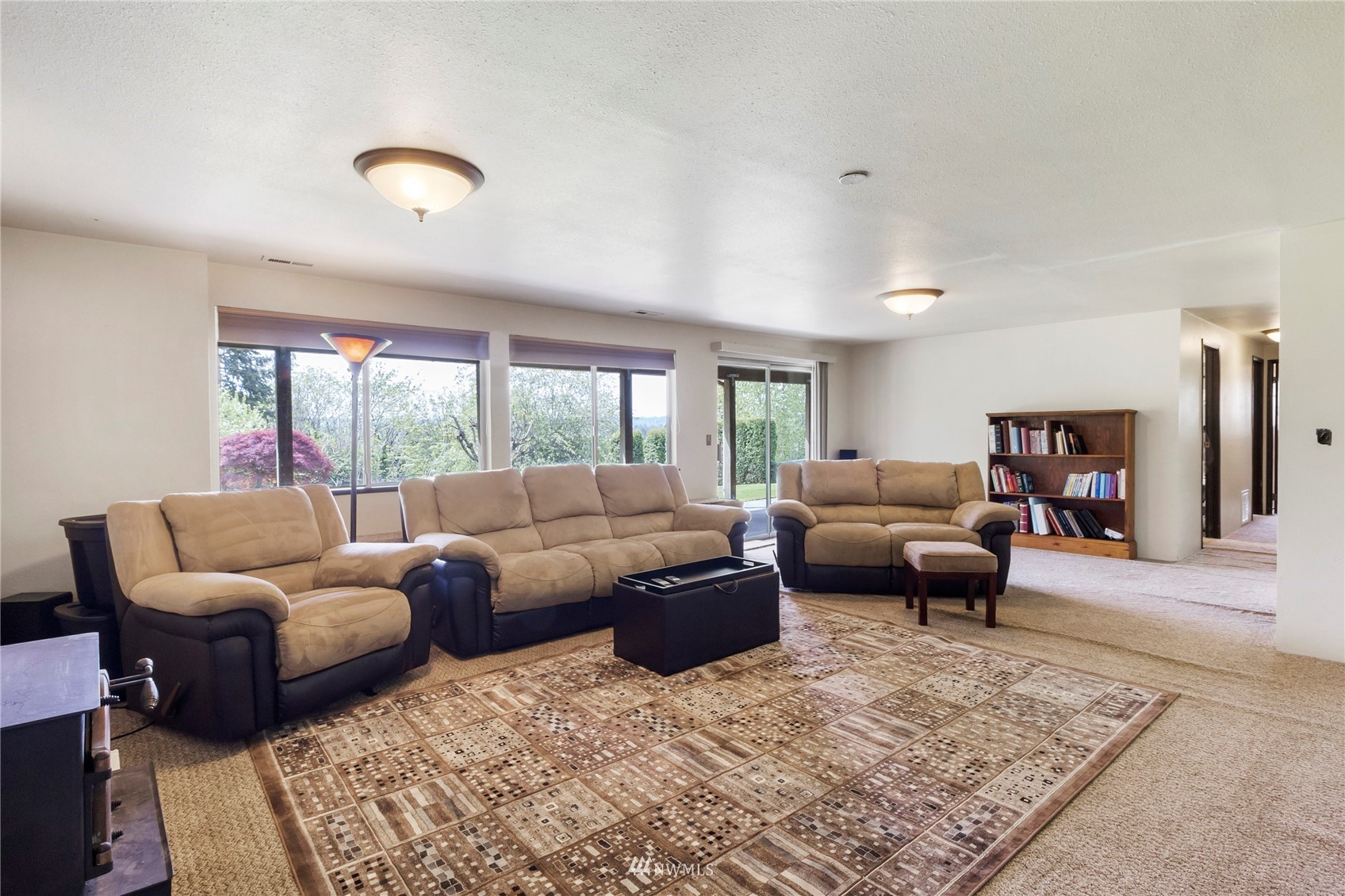11306 Karshner Road East Edgewood, WA 98372 - Photo 17 of 31 a living room with furniture and a rug
