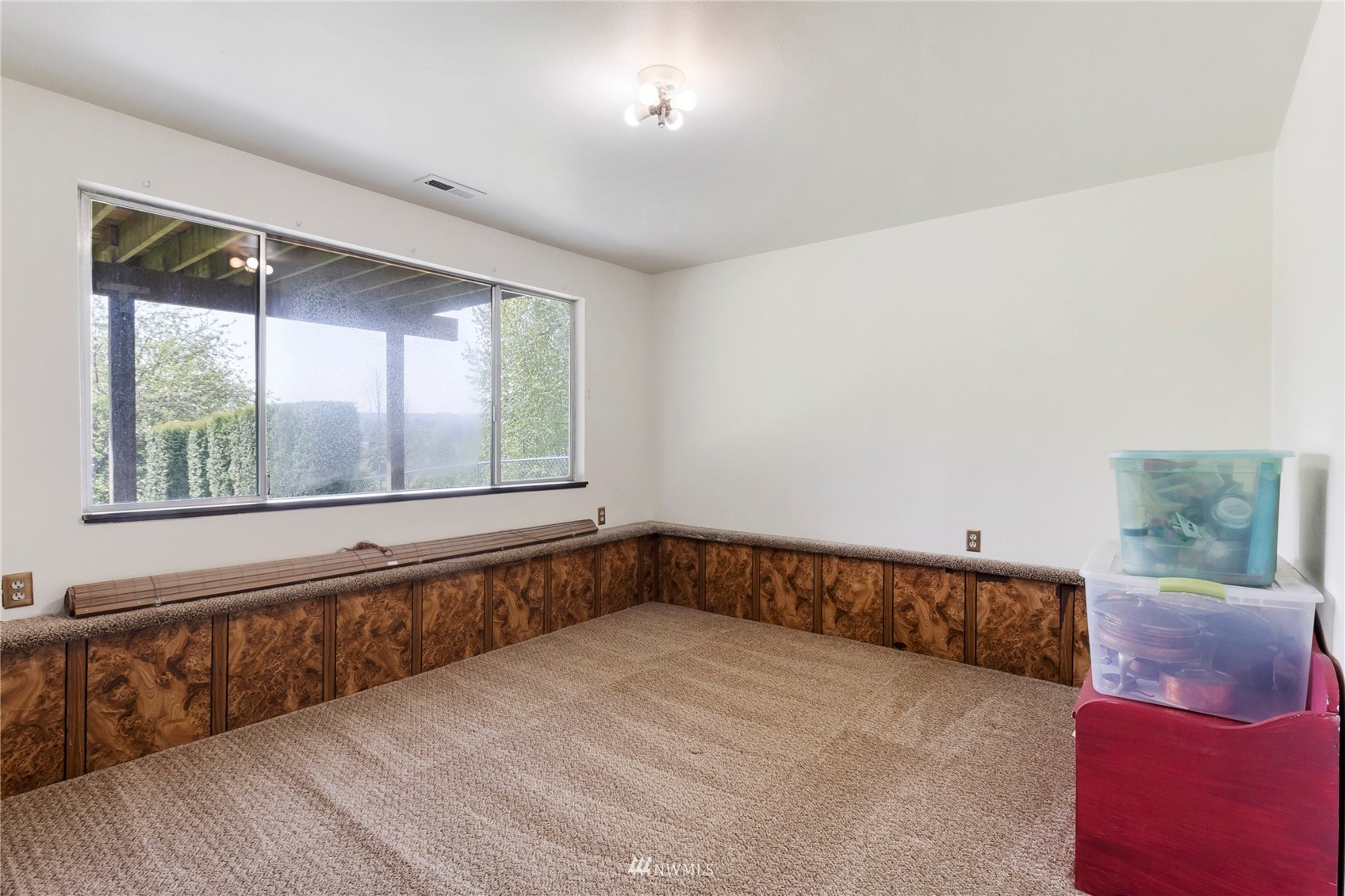 11306 Karshner Road East Edgewood, WA 98372 - Photo 23 of 31 a view of an empty room with a window