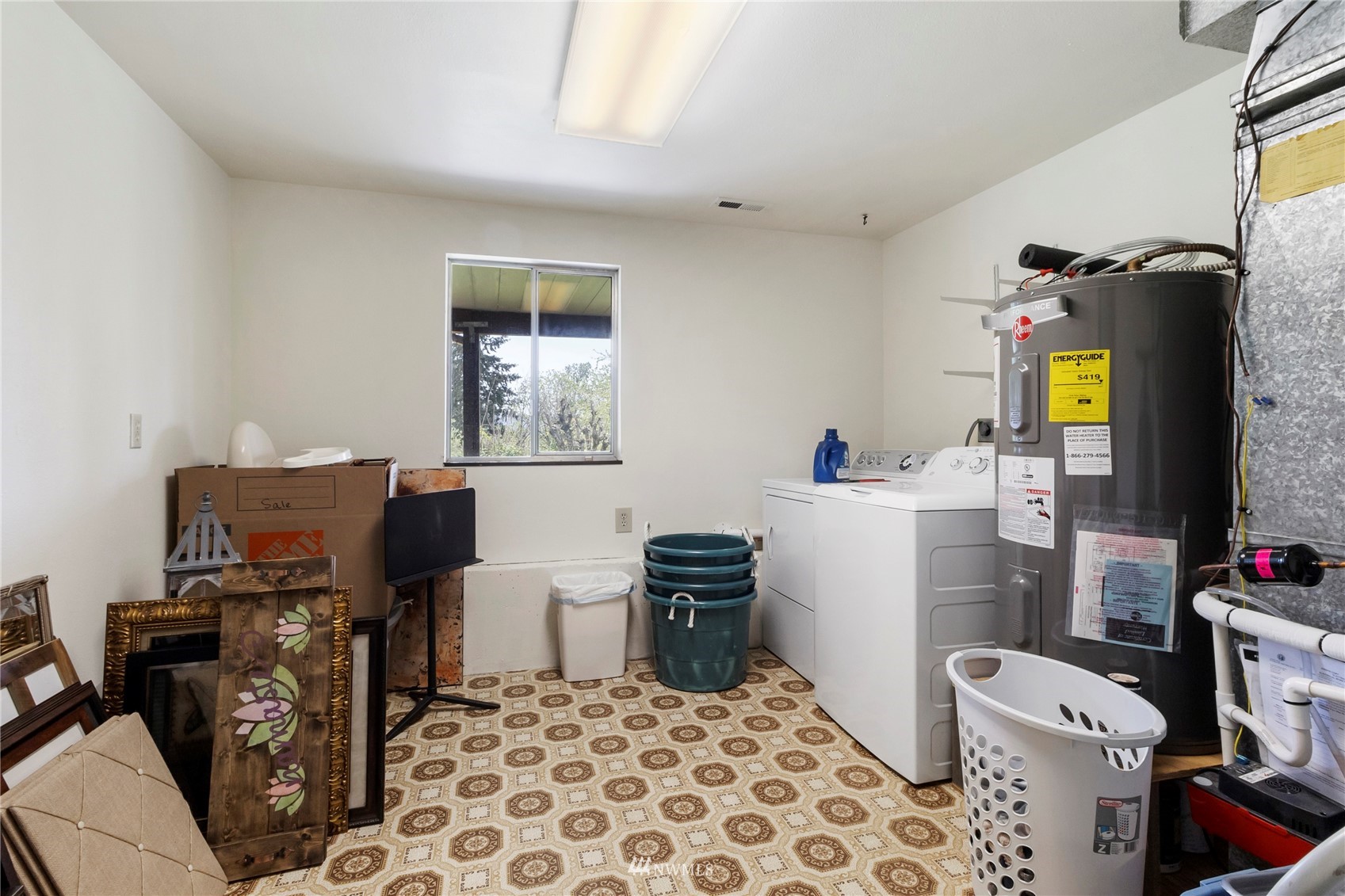 11306 Karshner Road East Edgewood, WA 98372 - Photo 24 of 31 a view of a workspace with furniture and a window