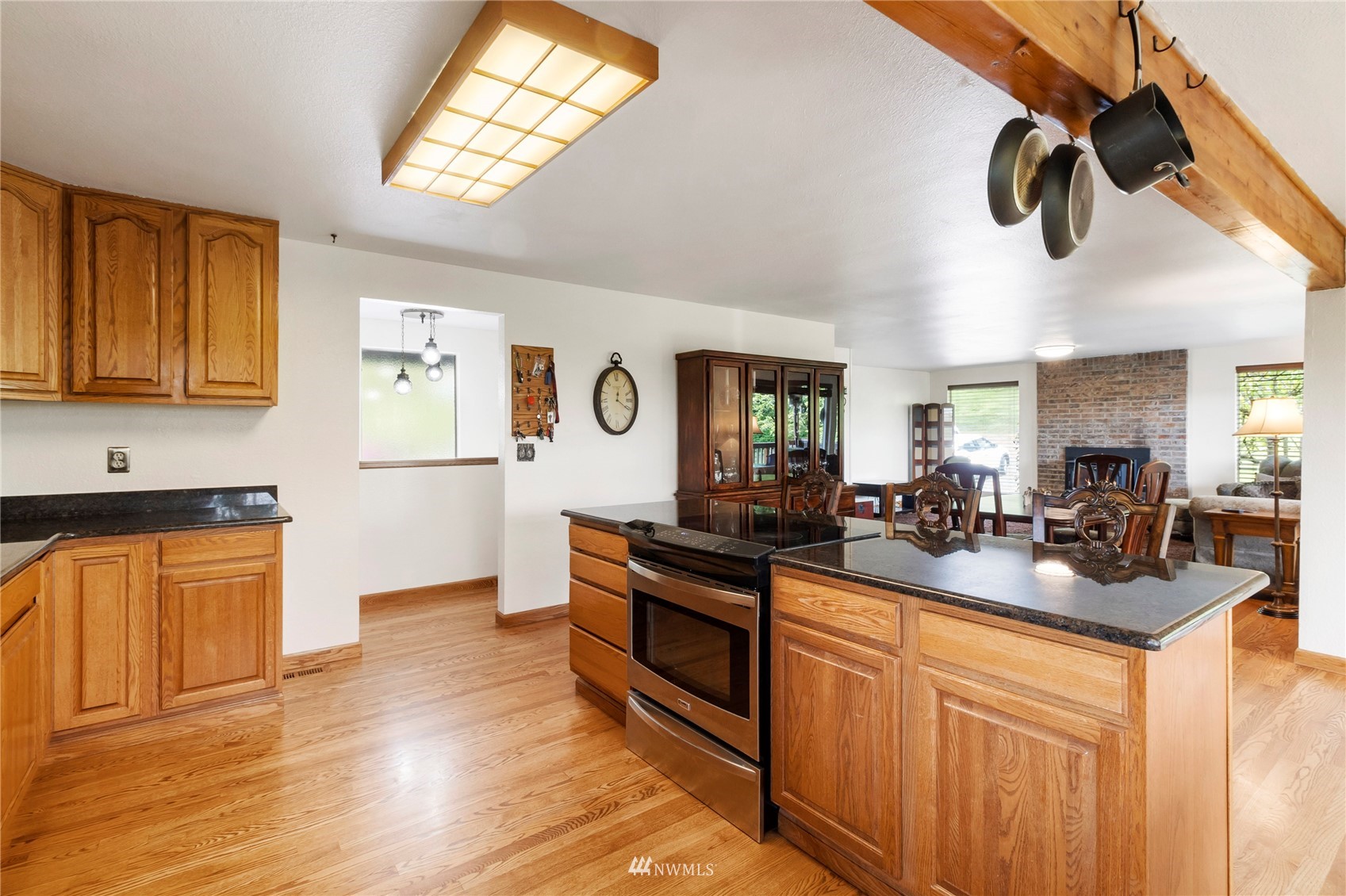 11306 Karshner Road East Edgewood, WA 98372 - Photo 7 of 31 a kitchen with lots of counter top space and a window