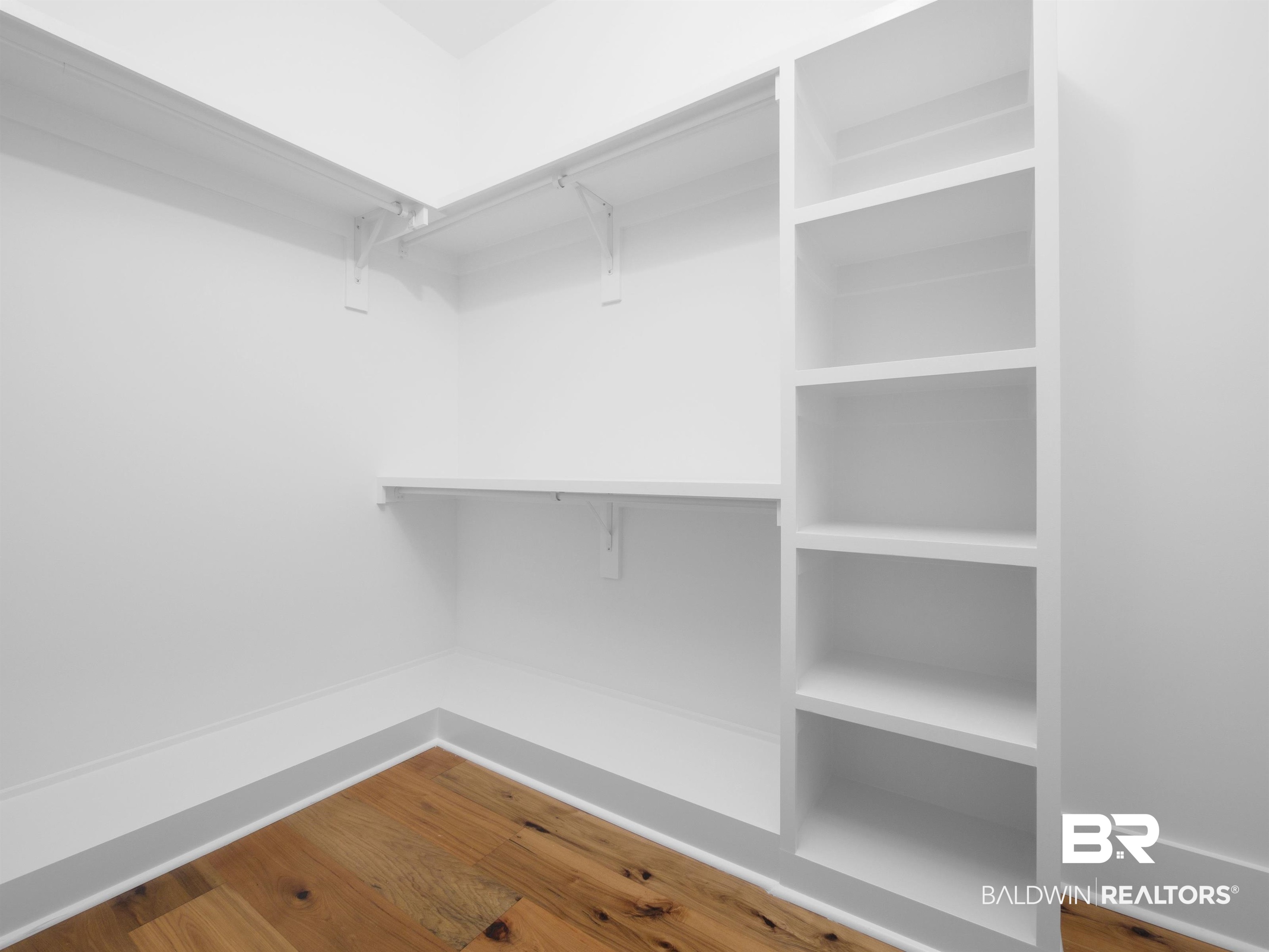 10970 Turin Avenue Fairhope, AL 36532 - Photo 16 of 61 Hardwood flooring, custom built dresser and custom shelving