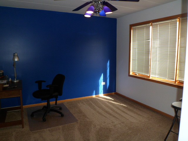 10538 SW Highway, Unit 203B Chicago Ridge, IL 60415 - Photo 13 of 14 a bedroom with a bed and a window