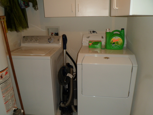 10538 SW Highway, Unit 203B Chicago Ridge, IL 60415 - Photo 14 of 14 a utility room with dryer and washer