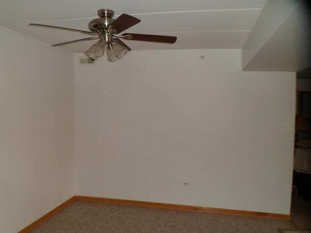 10538 SW Highway, Unit 203B Chicago Ridge, IL 60415 - Photo 4 of 14 a view of a small space with a fan