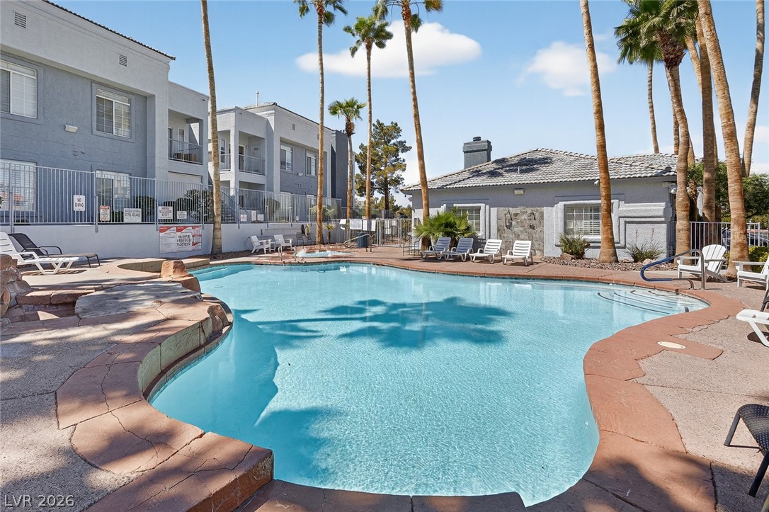 2201 Ramsgate Drive, Unit 117 Henderson, NV 89074 - Photo 30 of 31 Community pool and spa in a gated area