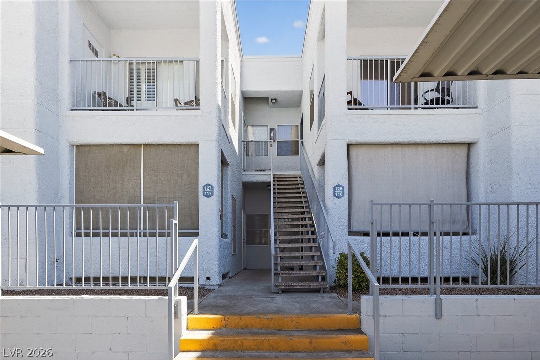 2201 Ramsgate Drive, Unit 117 Henderson, NV 89074 - Photo 3 of 31 Entrance door and balcony on the first floor left side