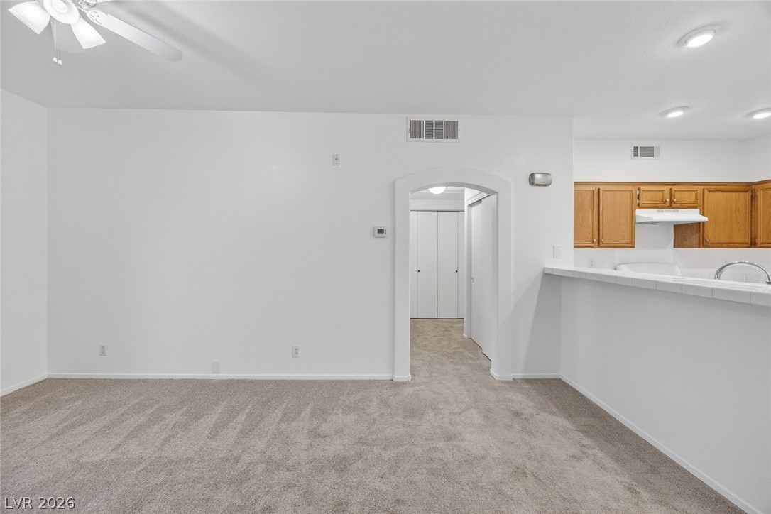 2201 Ramsgate Drive, Unit 117 Henderson, NV 89074 - Photo 6 of 31 Hallway Leading to Bedroom on the left.