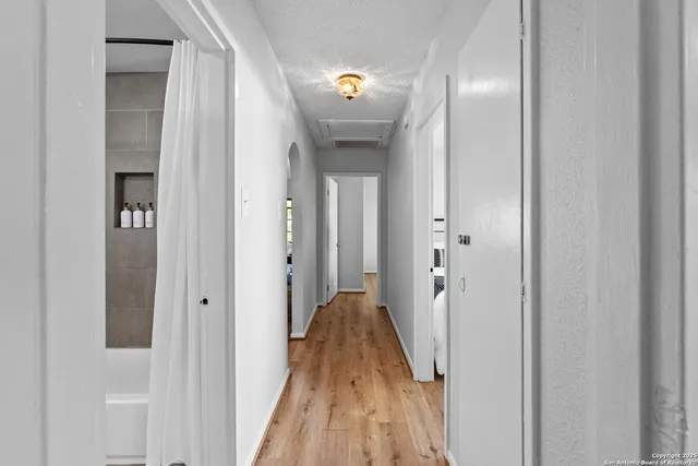a view of a livingroom from a hallway