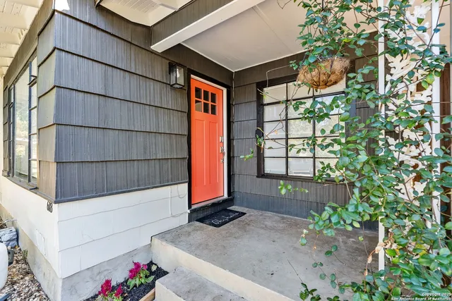 a front view of a house with a garage