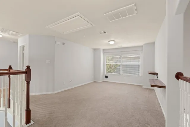 a view of empty room with front door