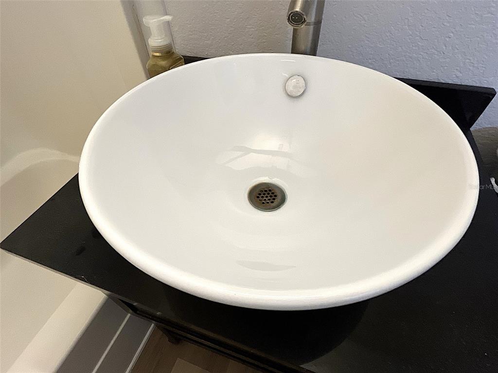 9596 Groveland Street Seminole, FL 33772 - Photo 25 of 26 a view of a sink in a bathroom