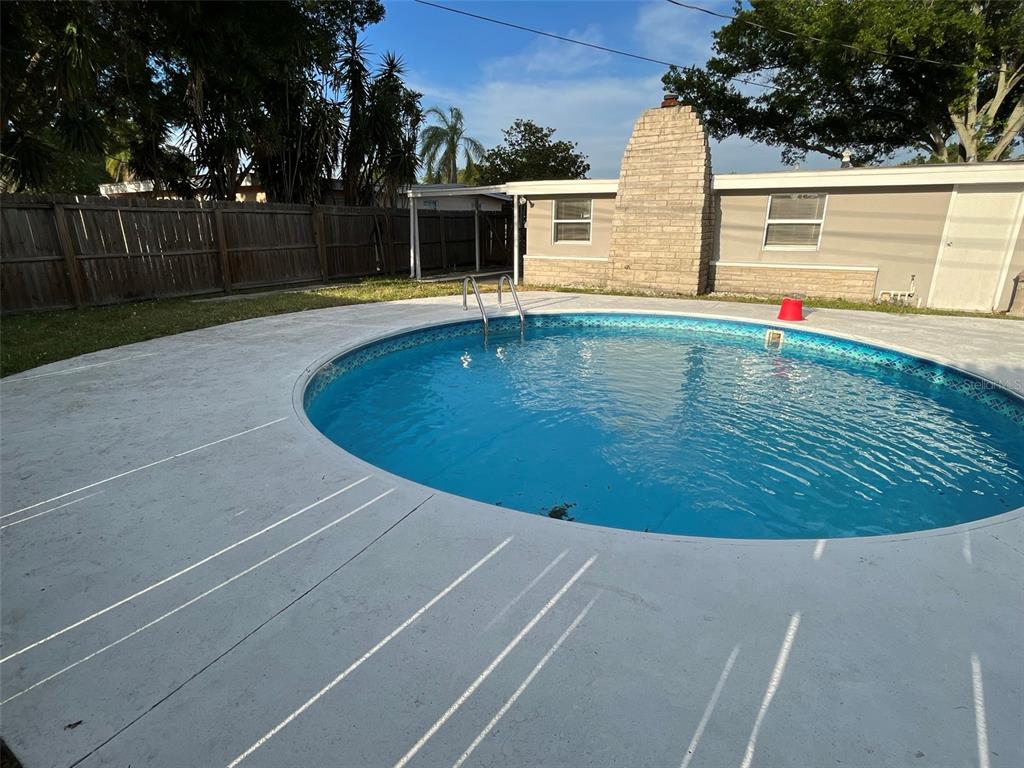 9596 Groveland Street Seminole, FL 33772 - Photo 3 of 26 a view of outdoor space deck and yard