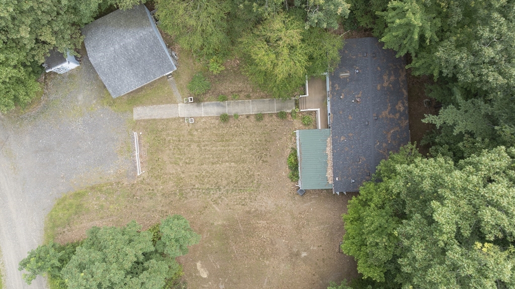 84 Forest Road Salisbury, MA 01952 - Photo 19 of 28 an aerial view of a house with a yard and large tree