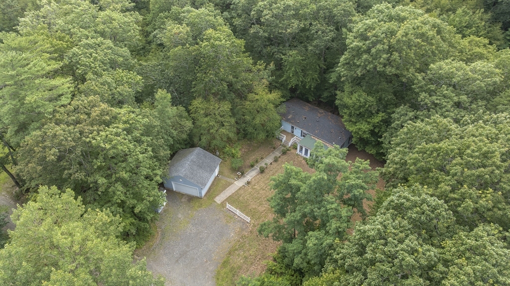 84 Forest Road Salisbury, MA 01952 - Photo 20 of 28 an aerial view of a house with a yard and outdoor seating