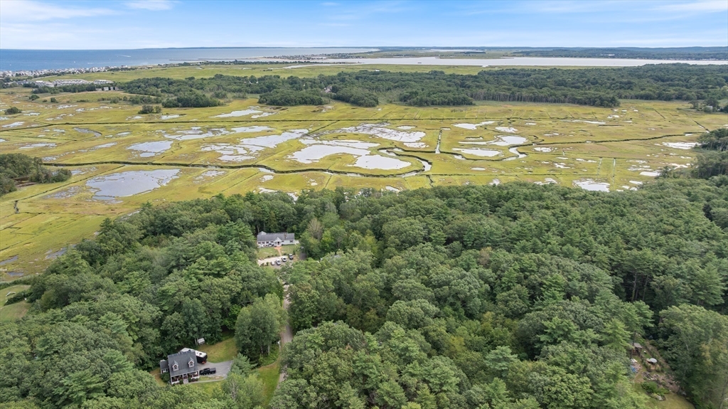 84 Forest Road Salisbury, MA 01952 - Photo 24 of 28 a view of an ocean and a mountain