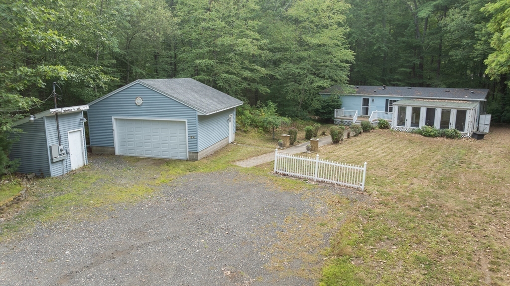84 Forest Road Salisbury, MA 01952 - Photo 27 of 28 a view of a house with a backyard and trees