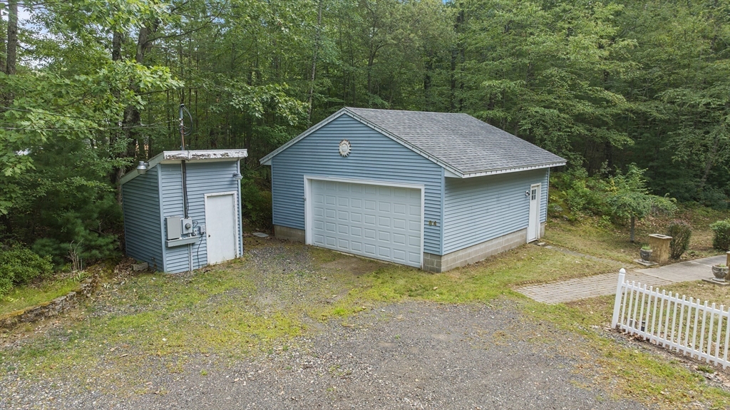 84 Forest Road Salisbury, MA 01952 - Photo 28 of 28 a house view with a garden space