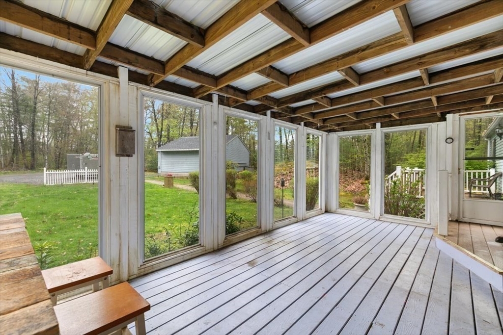 84 Forest Road Salisbury, MA 01952 - Photo 3 of 28 a view of porch with wooden floor