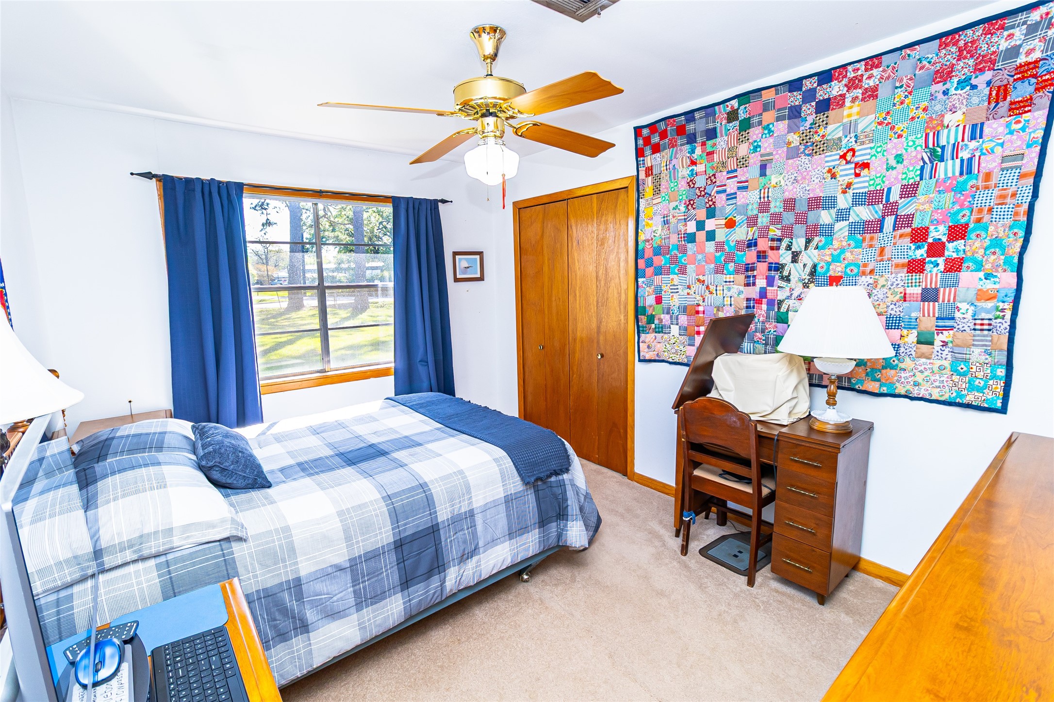 1202 Pecan Street Channelview, TX 77530 - Photo 16 of 35 a bedroom with a bed and a window