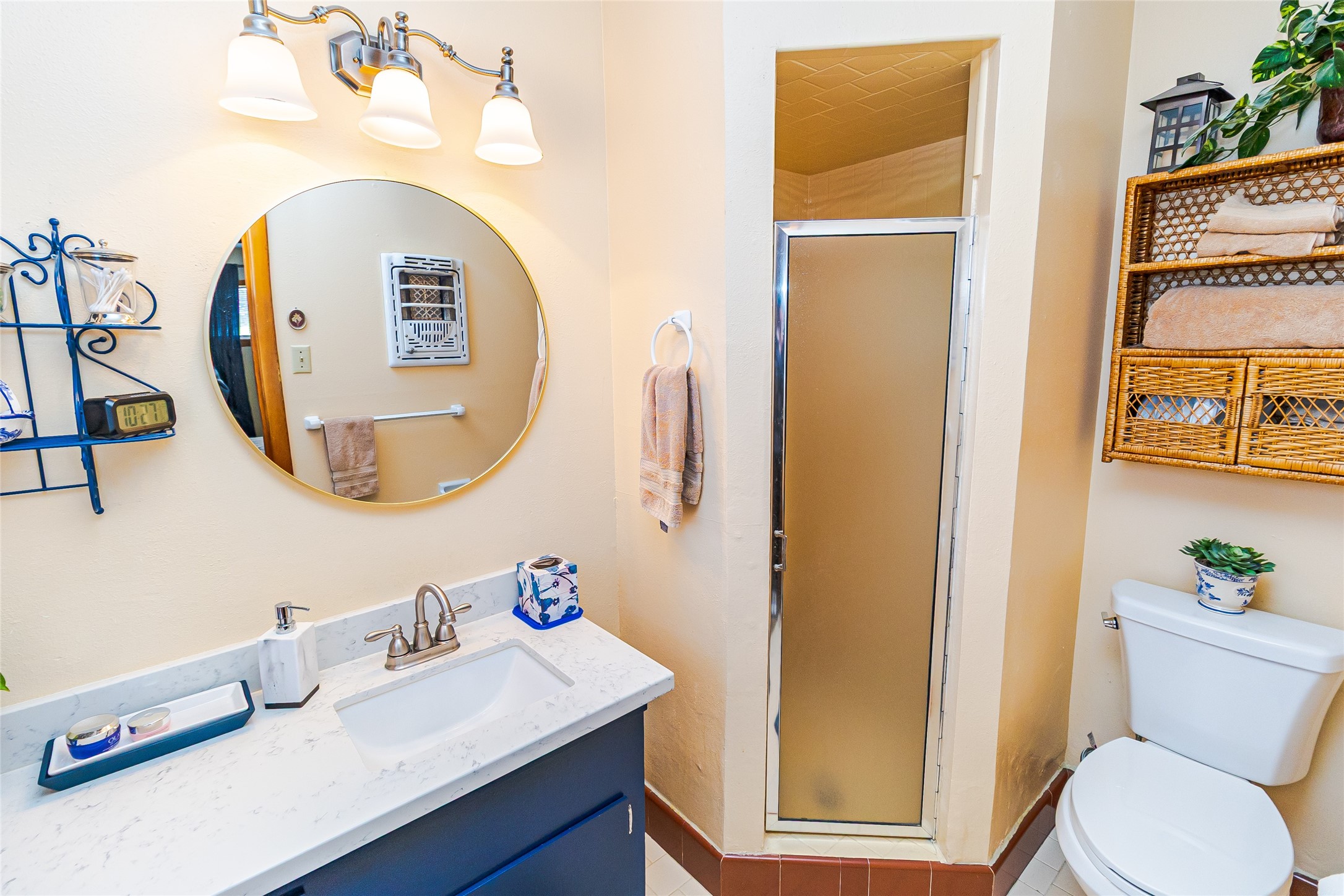 1202 Pecan Street Channelview, TX 77530 - Photo 19 of 35 a bathroom with a sink mirror and toilet