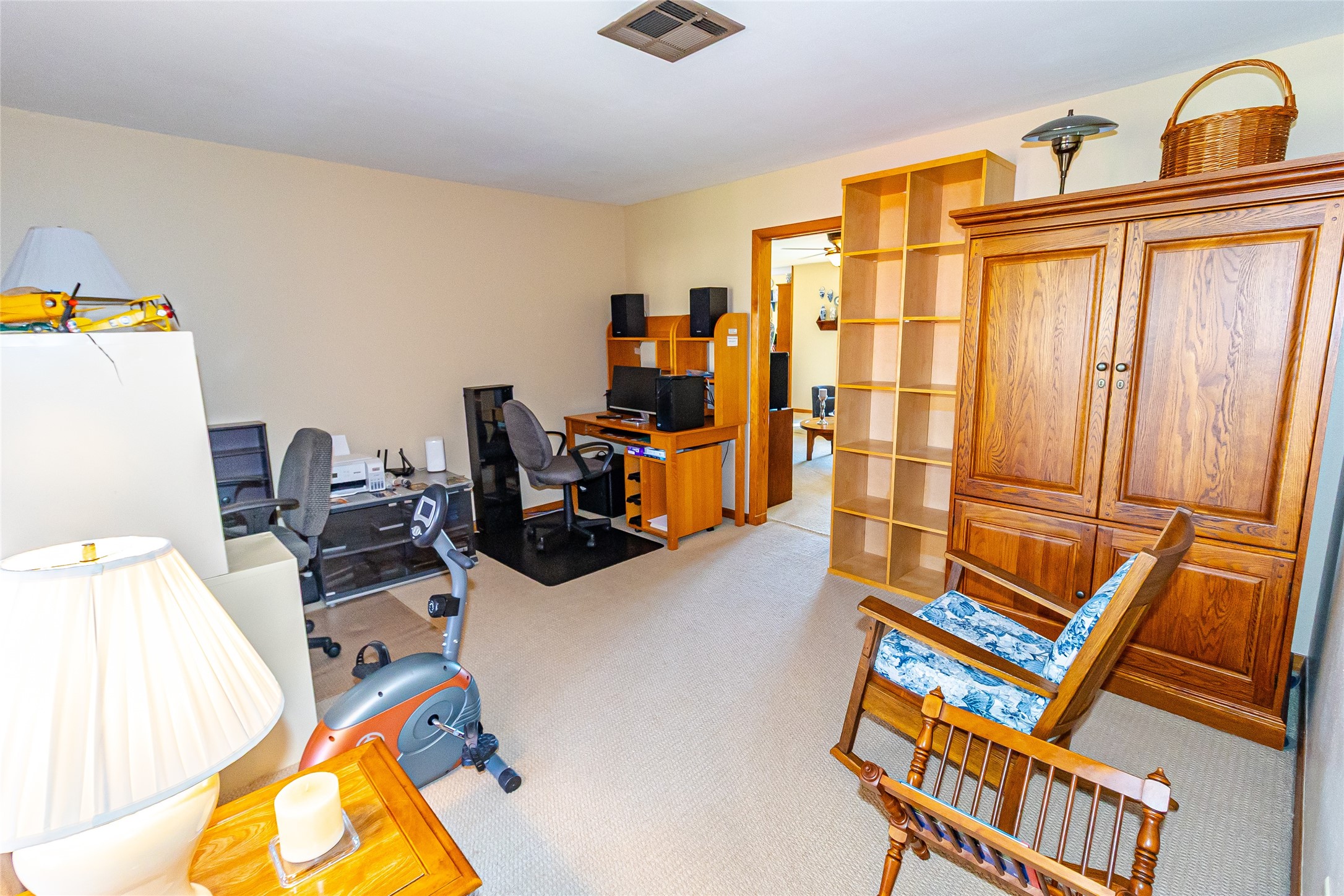 1202 Pecan Street Channelview, TX 77530 - Photo 23 of 35 a view of a workspace with furniture and a window
