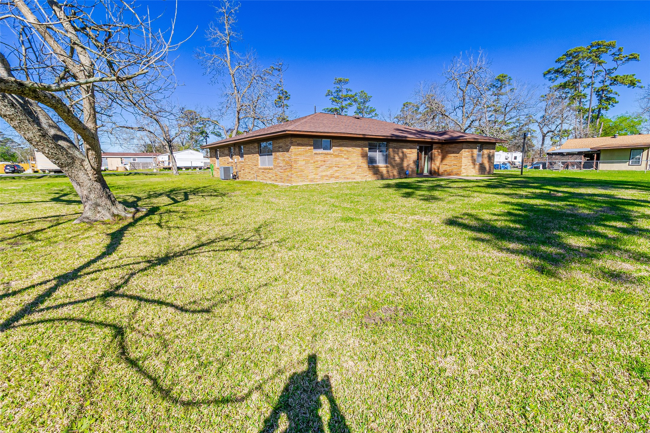 1202 Pecan Street Channelview, TX 77530 - Photo 30 of 35 a front view of a house with a garden