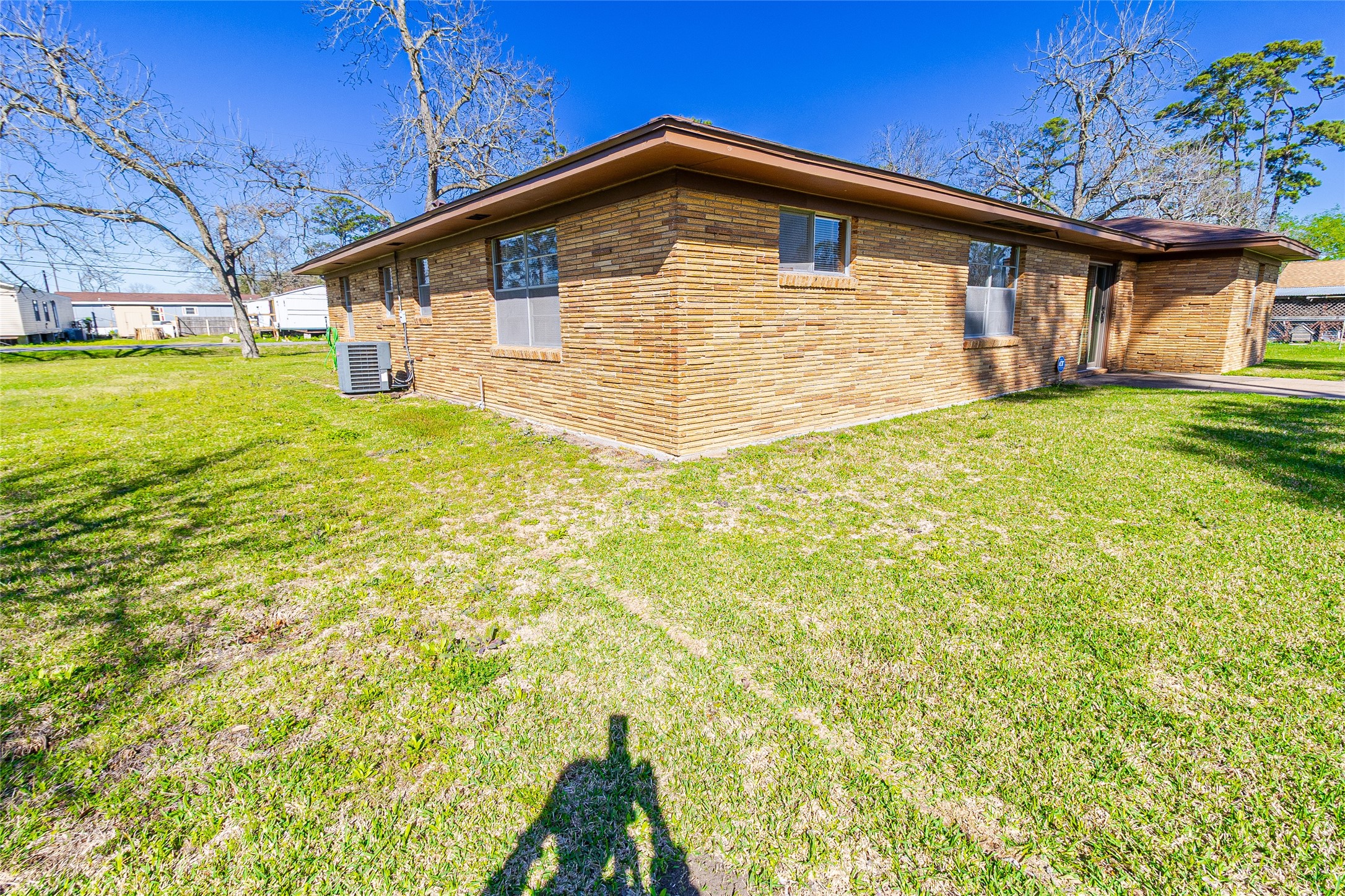 1202 Pecan Street Channelview, TX 77530 - Photo 31 of 35 a front view of a house with garden