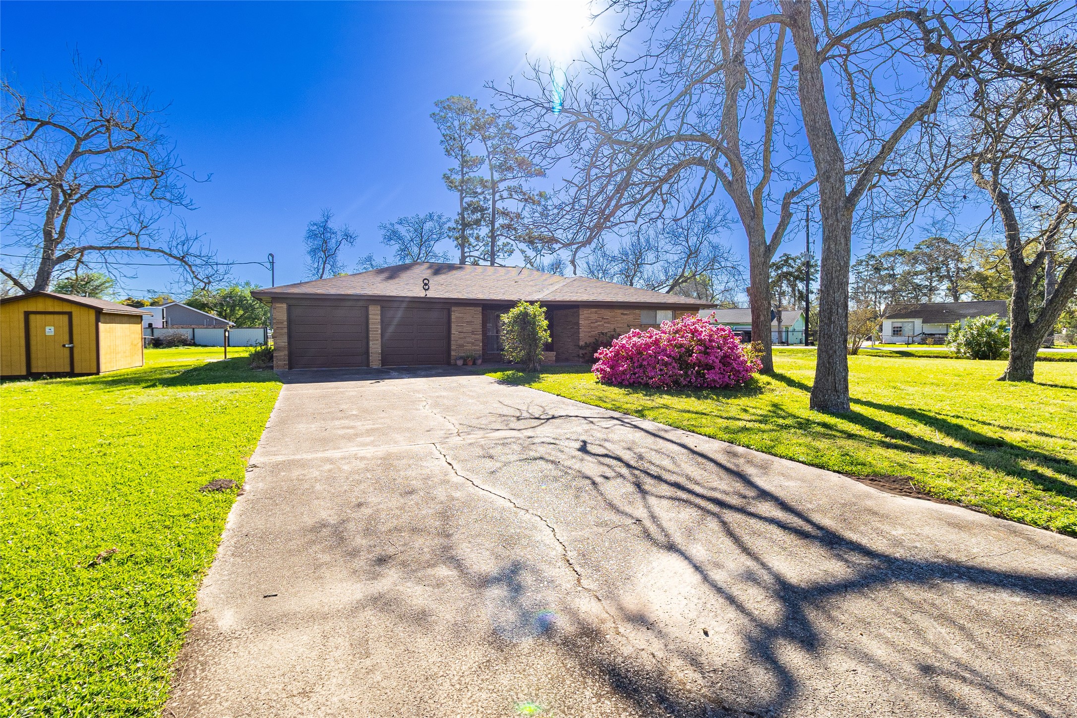 1202 Pecan Street Channelview, TX 77530 - Photo 6 of 35 a view of a house with yard and sitting area