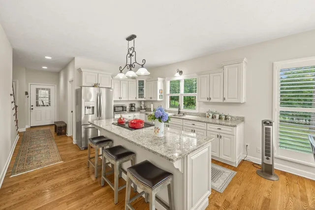 a kitchen with granite countertop lots of counter top space