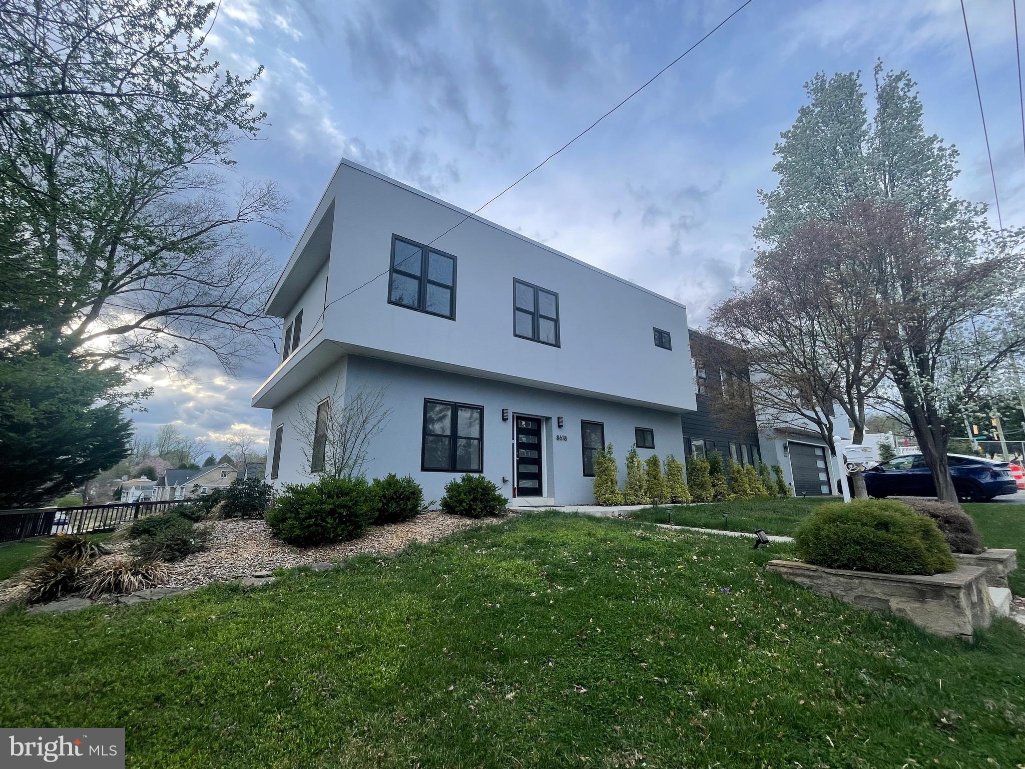 8618 Jones Mill Road Chevy Chase, MD 20815 - Photo 2 of 52 a front view of a house with garden