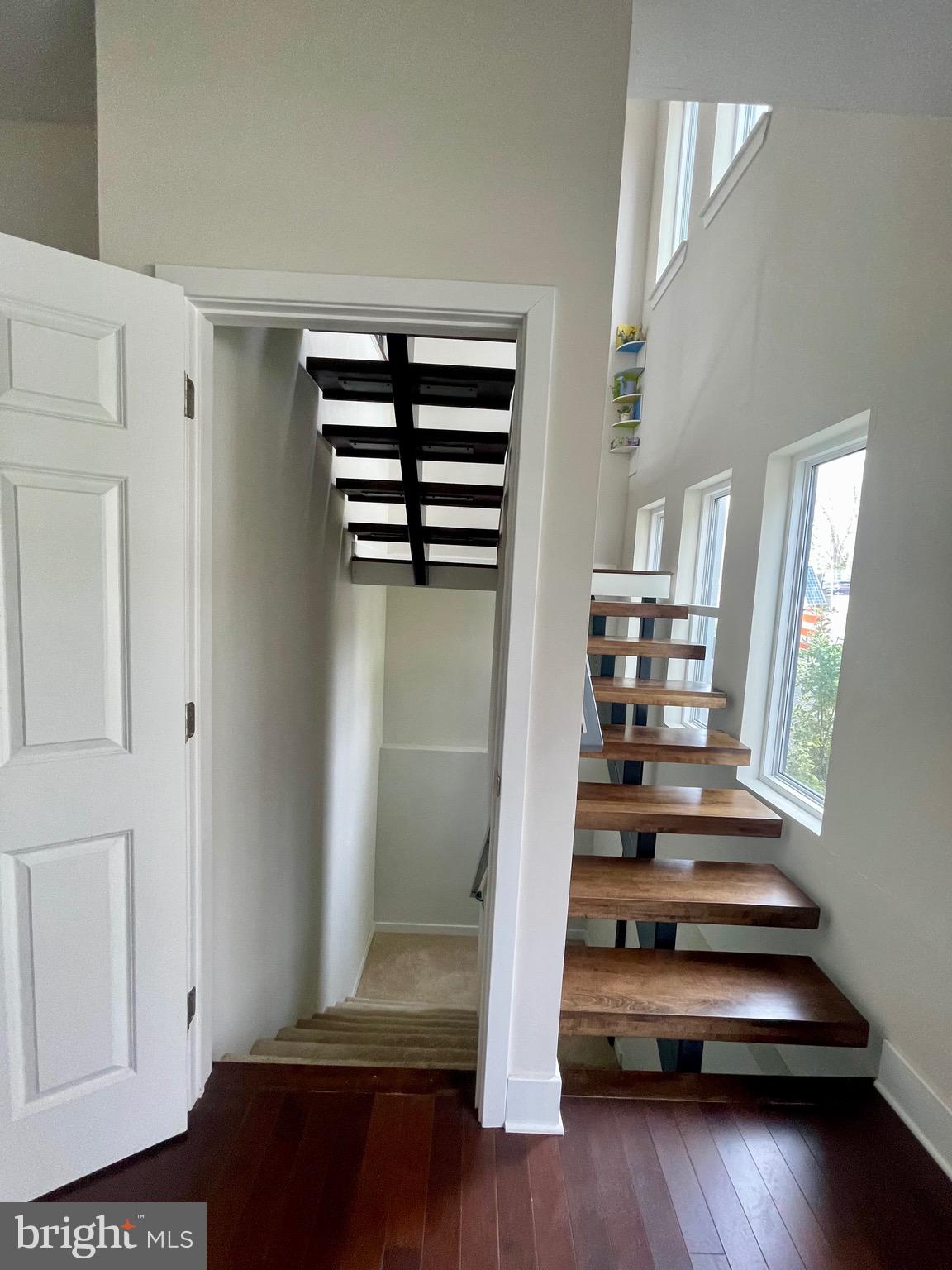 8618 Jones Mill Road Chevy Chase, MD 20815 - Photo 24 of 52 a view of entryway with stairs and wooden floor
