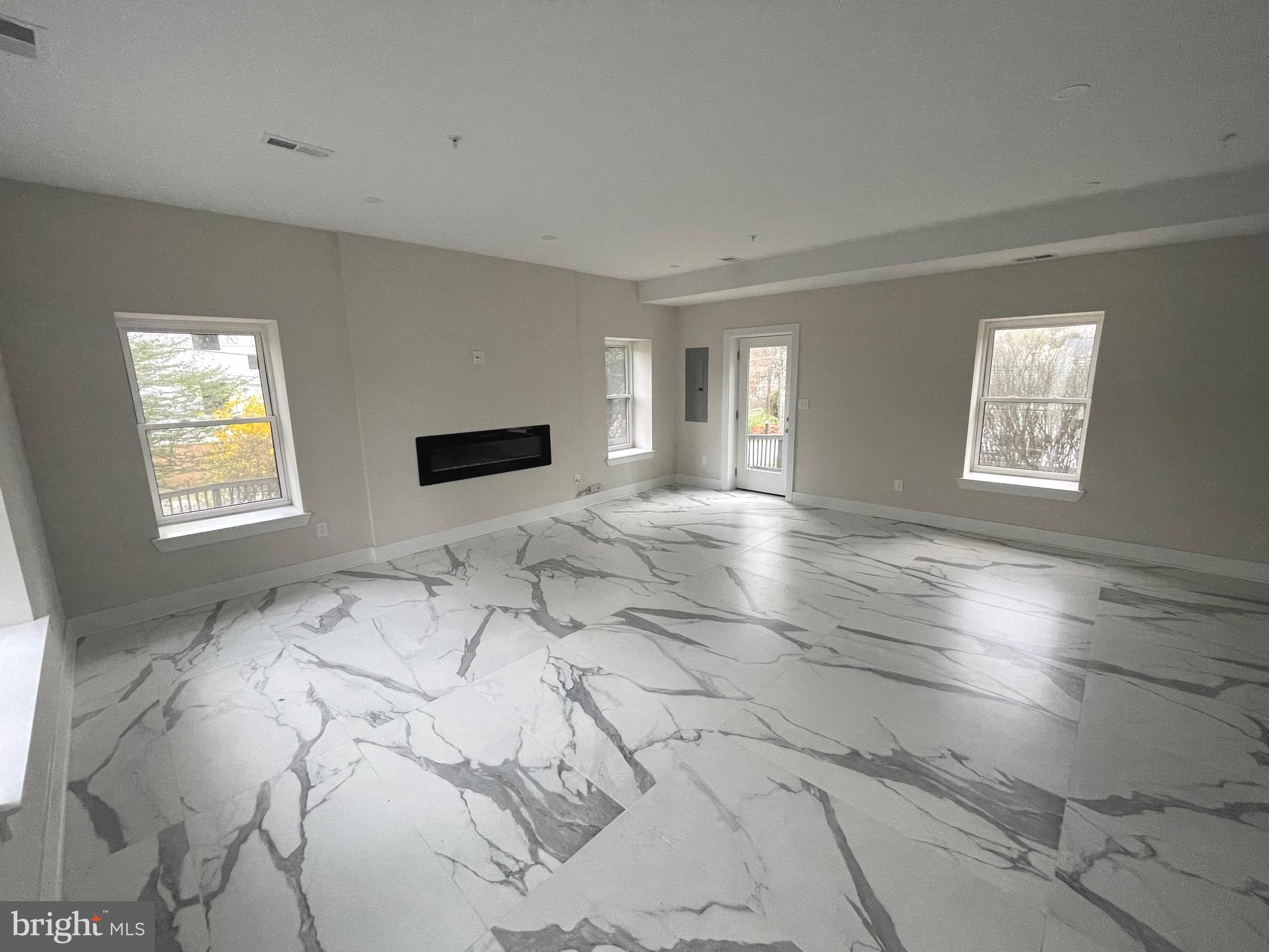 8618 Jones Mill Road Chevy Chase, MD 20815 - Photo 5 of 52 a bedroom with a bed and a window