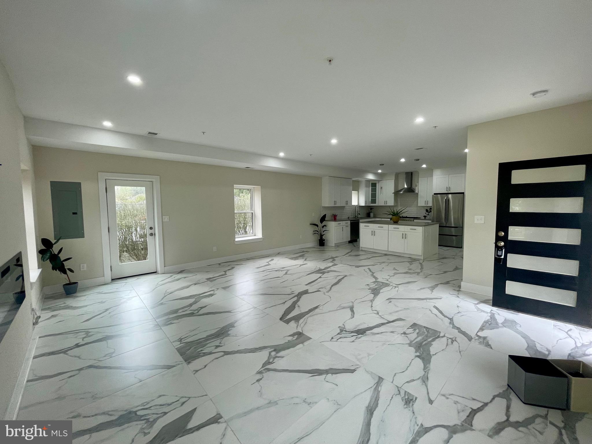 8618 Jones Mill Road Chevy Chase, MD 20815 - Photo 6 of 52 a view of a livingroom with furniture and windows