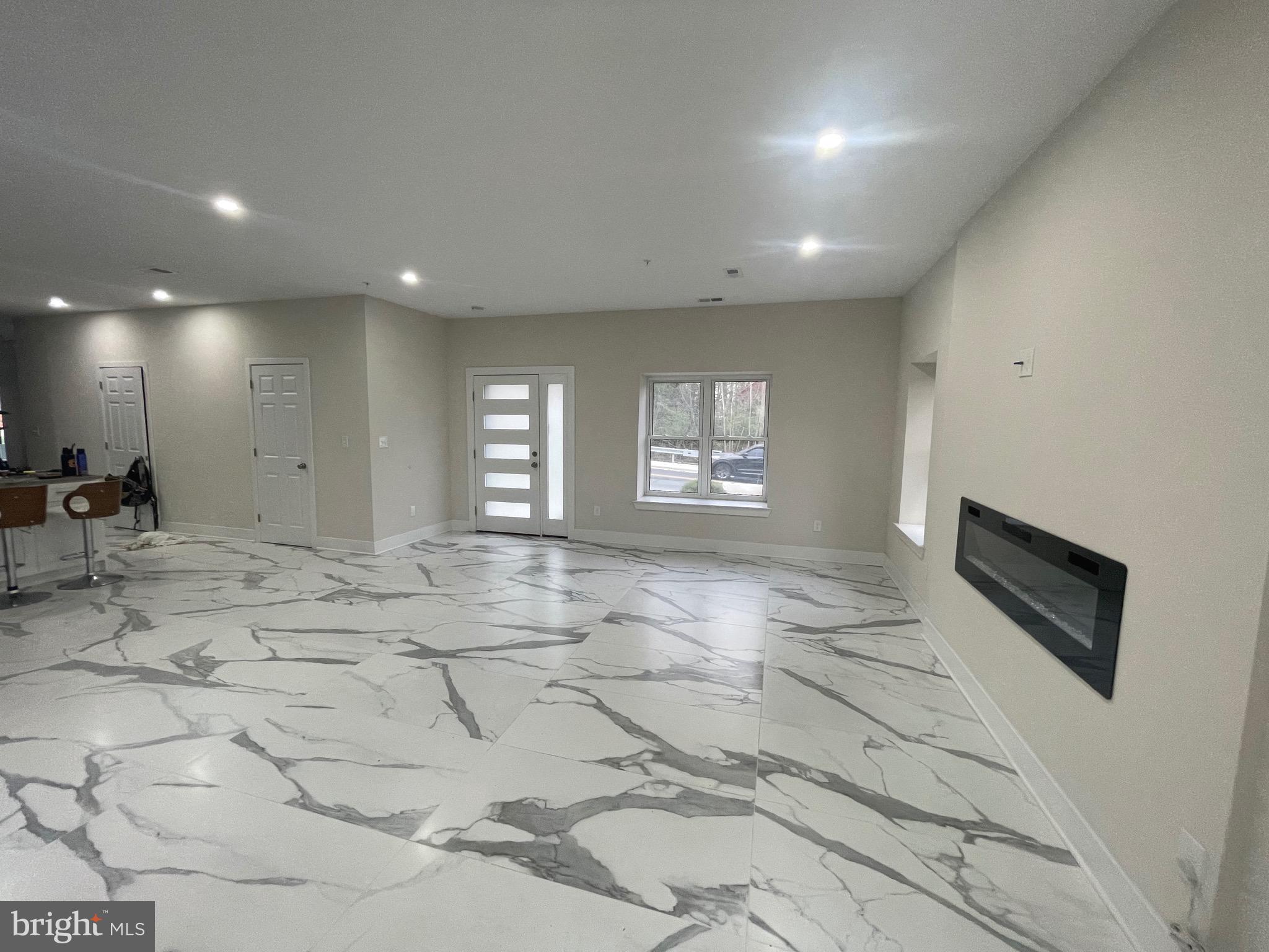 8618 Jones Mill Road Chevy Chase, MD 20815 - Photo 9 of 52 a view of entryway and kitchen